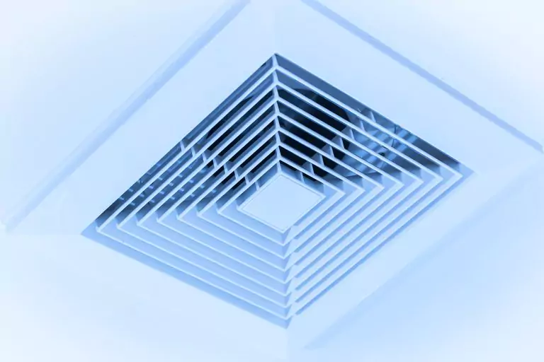 photo of an air vent mounted on the ceiling