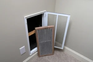 dirty air filter next to HVAC return vent